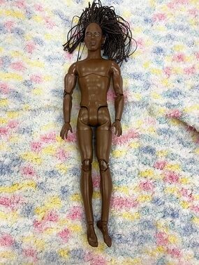 Ken Looks Doll Barbie